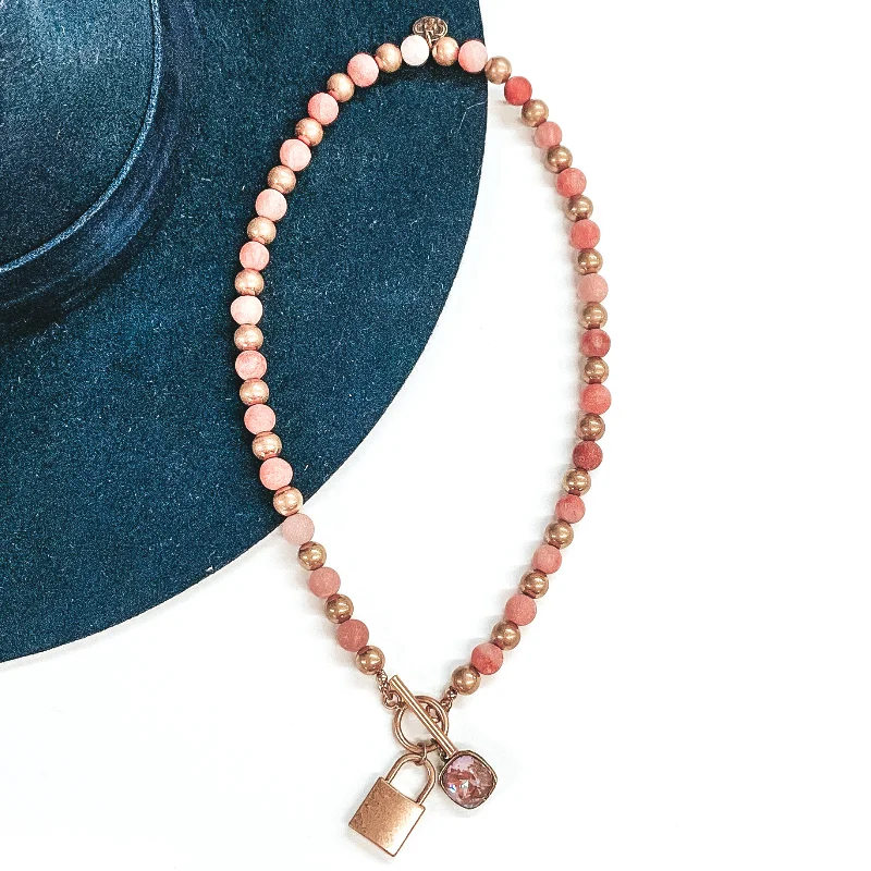 Fine cord necklaces-Pink Panache | Pink Stone Beaded Toggle Front Necklace with Gold Lock Charm and Cappuccino Delight Cushion Cut Drop Crystal