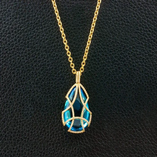 Dove charm necklaces-Diamond Tear Drop Cage Necklace with Blue Topaz Insert