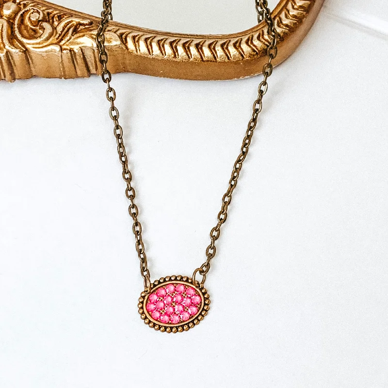 Fine cord necklaces-Pink Panache | Mini Bronze Oval Necklace with Pink Lotus Delight Crystals